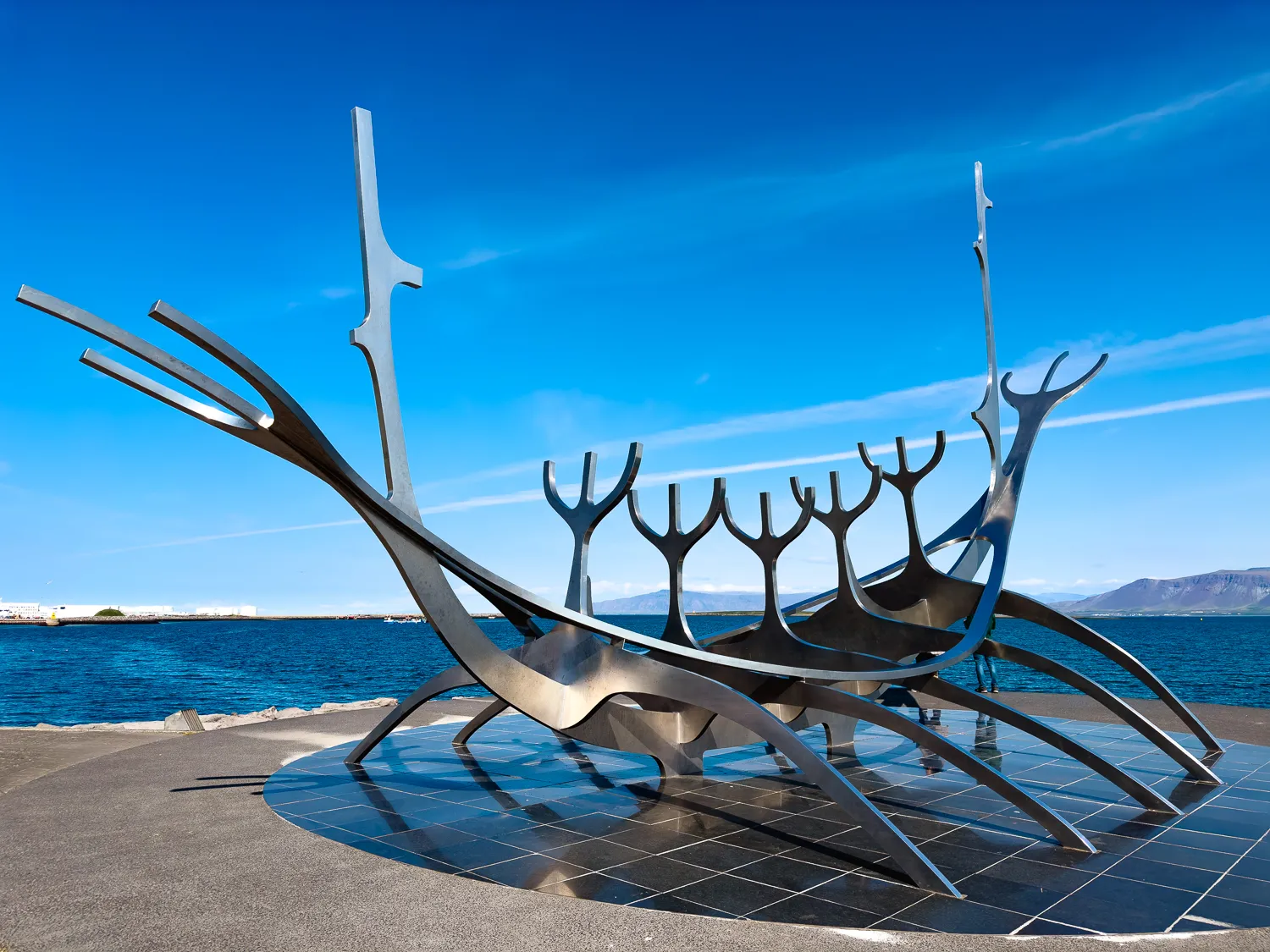 Breathtaking view of Mount Kilimanjaro under a clear blue sky, perfect for travel and adventure enthusiasts.